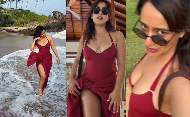HOT: Neha Sharma in Bold Red Swimsuit