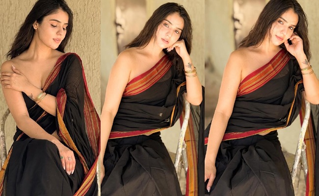 HOT: Embodiment Of Elegance In Black Saree