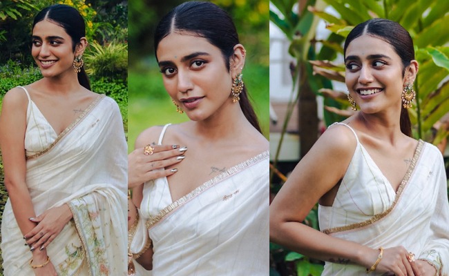HOT: Wink Lady's Elegance In Cream Saree