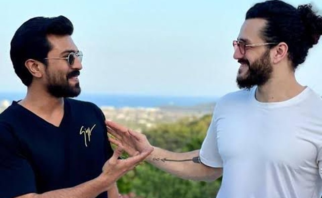 Ram Charan's Threat for Akhil Akkineni Again