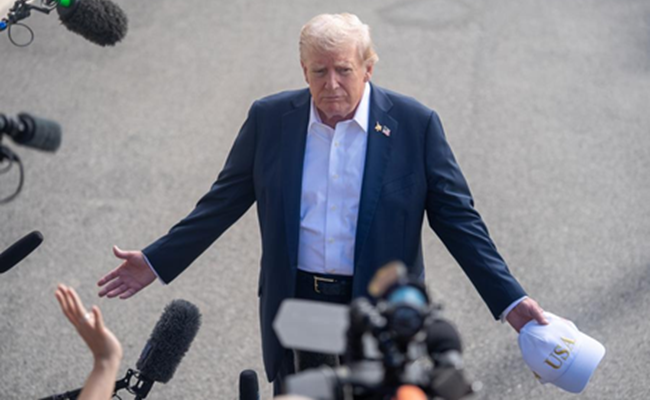 Trump defends tariffs, floats $2,000 dividend