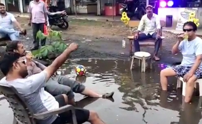 What an idea! Residents throw party on pothole-filled road