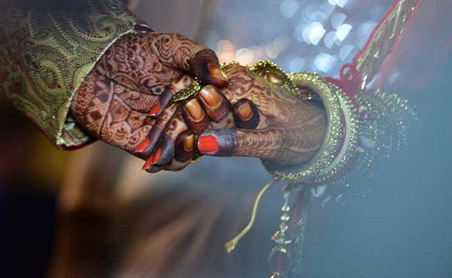 Groom kisses bride, she refuses to marry him