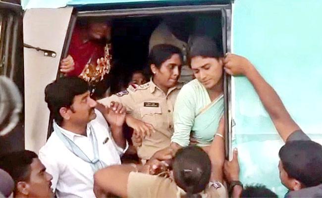 Sharmila held after TRS workers set afire her caravan