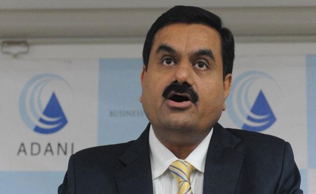 Adani Group's market losses hit $100 billion