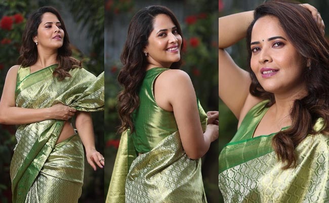 Pics: Anasuya In Sleeveless Green Blouse