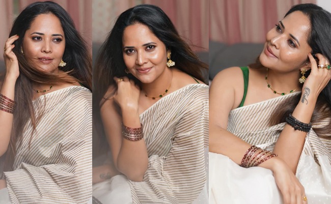 HOT: Anasuya Greets In Sleeveless Blouse