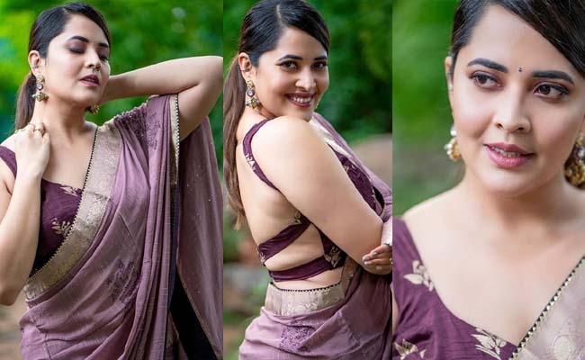 Pics: Anasuya's Enchanting Curves In Saree