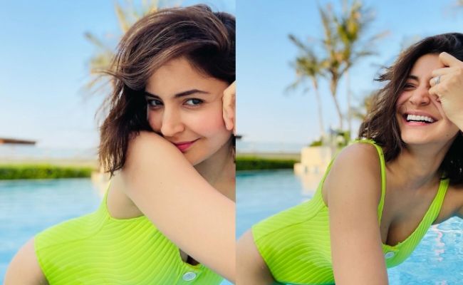 Anushka Sharma flaunts baby bump in pool photo, shares message of