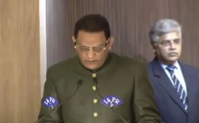 Azharuddin takes oath as T'gana Cabinet minister