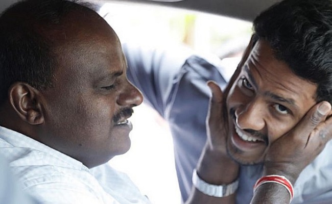 Karnataka: Kumaraswamy wins but son Nikhil loses