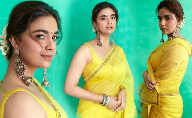 Pics: Talented Beauty In Yellow Sleeveless