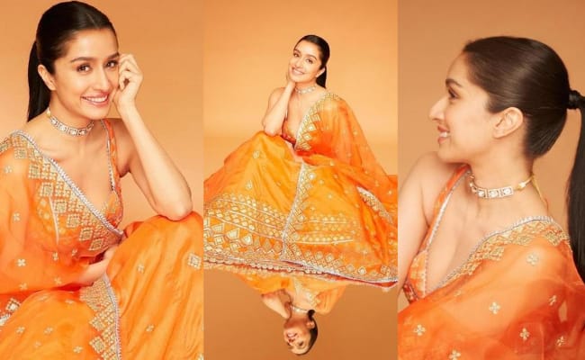 Pics: Lady Blossoms Like An Orange Rose