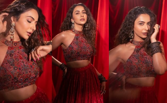 HOT: Tall Beauty Radiates Glamour In Red