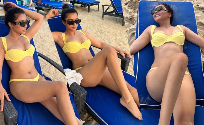 Pics: Luscious Lady In Yellow Bikini