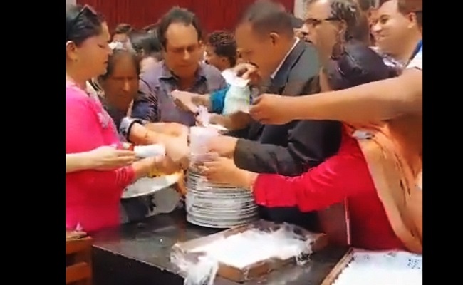 Teachers jostle to grab plate, video goes viral