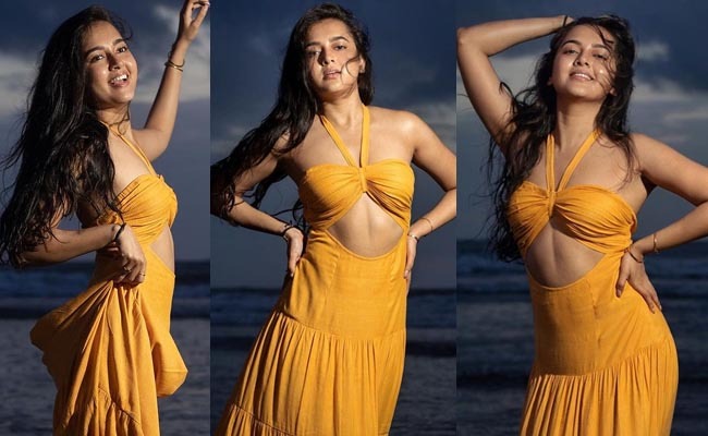 Pics: Lady With Curves Poses In Yellow
