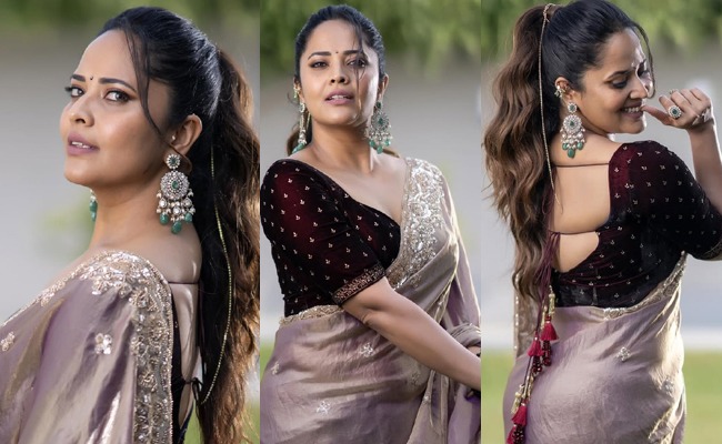 HOT: Anasuya Teases With Her Saree Curves