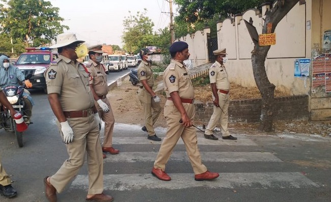 Policemen Going Door To Door In Vijayawada