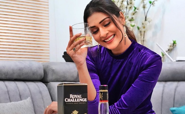 Payal Rajput Poses With Whisky Bottle