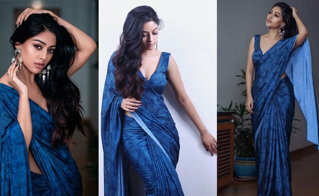 Pics: Beauty Draped In Blue Saree