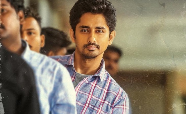 Maha Samudram 1st Look: Siddharth Stands In A Queue
