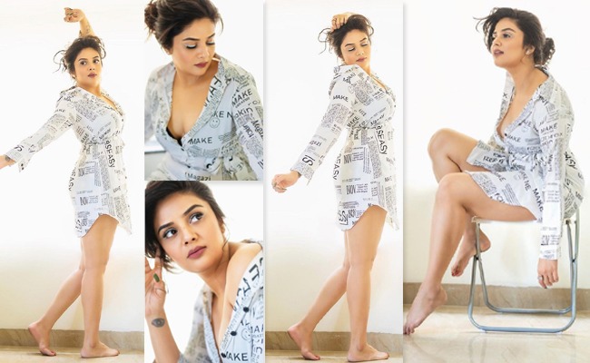 Pics: Beautiful Lady In Trendy Newspaper Dress