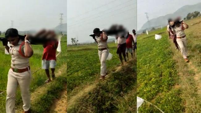 AP woman officer carries corpse after villagers refuse
